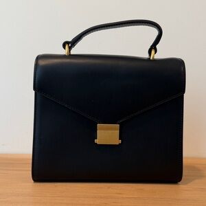 Quince Black Top Handle Bag